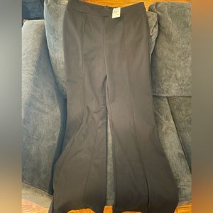 Brand New Fashion Nova black pants. Can be dressed up or down. Super cute!
